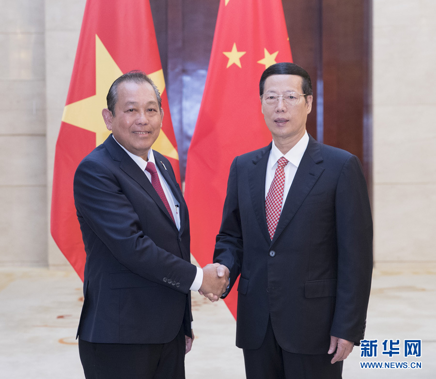  9月11日，中共中央政治局常委、國(guó)務(wù)院副總理張高麗在廣西南寧會(huì)見前來出席第十四屆中國(guó)－東盟博覽會(huì)和中國(guó)－東盟商務(wù)與投資峰會(huì)的越南常務(wù)副總理張和平。新華社記者王曄攝