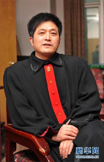 （圖文互動(dòng)）其人如蘭，既潔且馨——追記“全國(guó)模范法官”胡國(guó)運(yùn)
