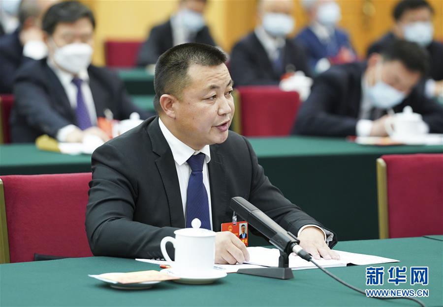 （新華全媒頭條·圖文互動）（11）從人民中汲取磅礴力量——習近平總書記同出席2020年全國兩會人大代表、政協(xié)委員共商國是紀實