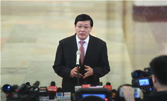 全國社?；鹄硎聲硎麻L樓繼偉接受采訪