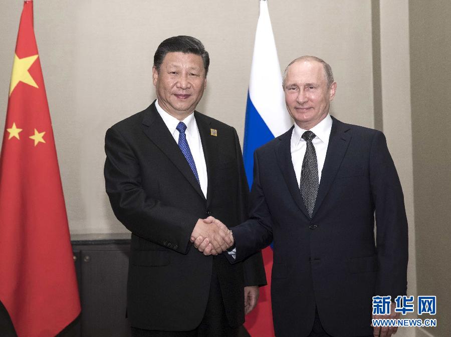 6月8日，國(guó)家主席習(xí)近平在阿斯塔納會(huì)見俄羅斯總統(tǒng)普京。 新華社記者蘭紅光 攝