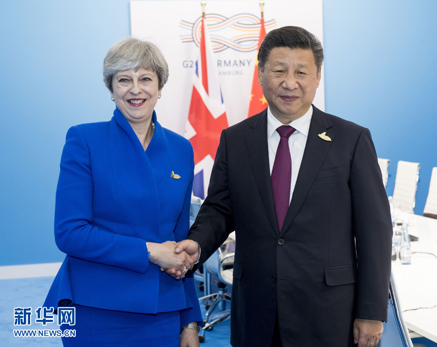 7月7日，國(guó)家主席習(xí)近平在漢堡會(huì)見英國(guó)首相特雷莎·梅。 新華社記者李學(xué)仁 攝